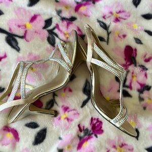 Heels by Nine West.  2 1/2 inch open-toed sling backs w/faux crystal jewels.
